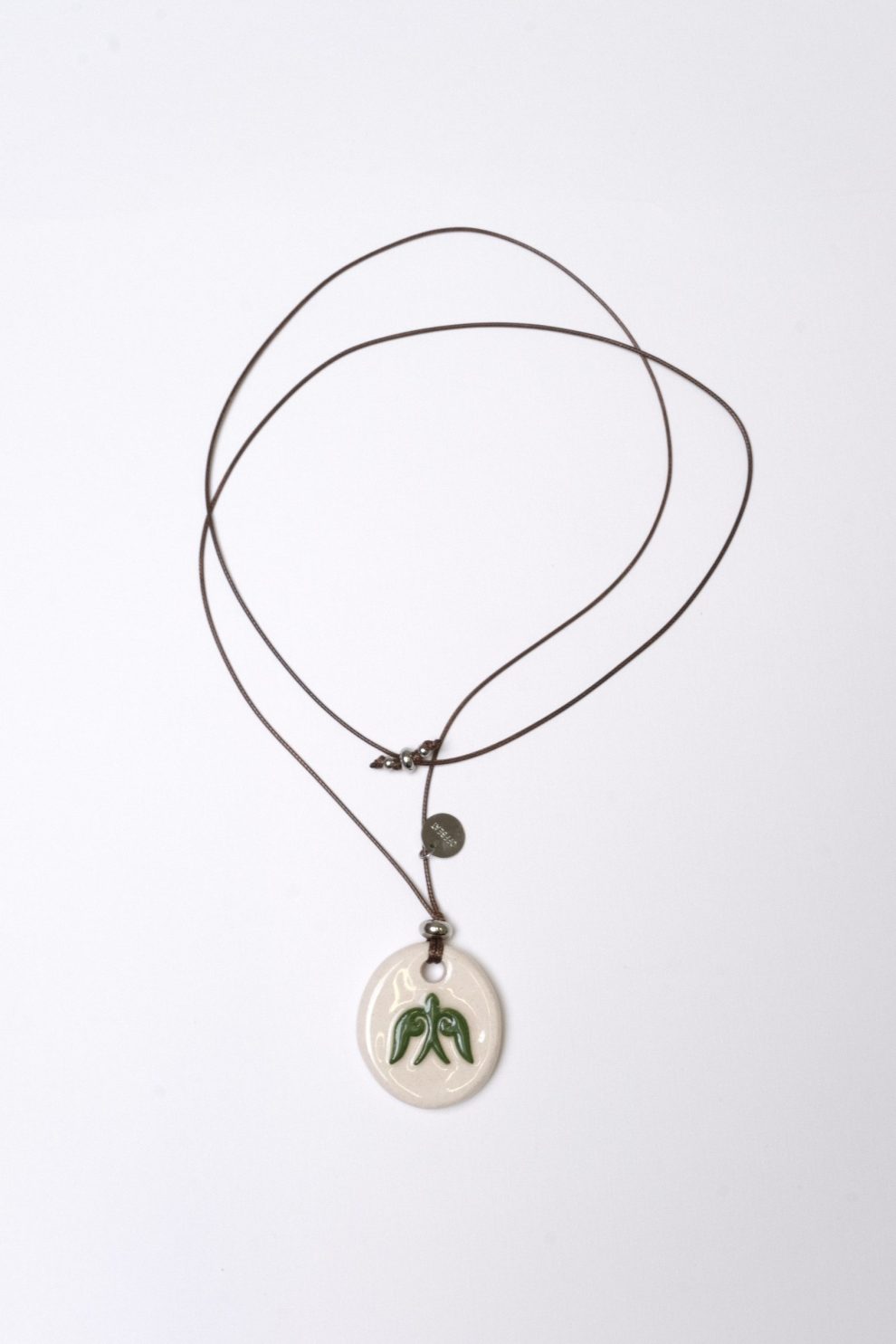 Подвеска Nomad Art на шнуре