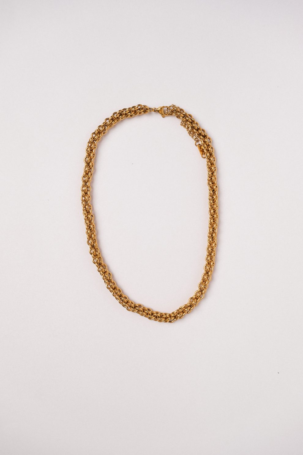 Цепь массивная круглая переплетенная в позолоте