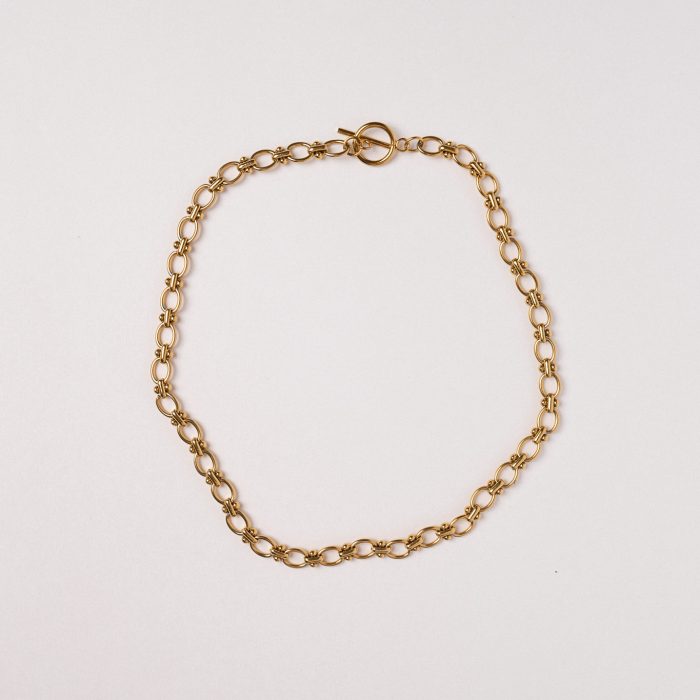 Цепь из овала со вставками из кругляшков в позолоте